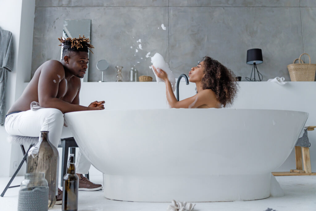 A couple enjoying a luxurious foam bath