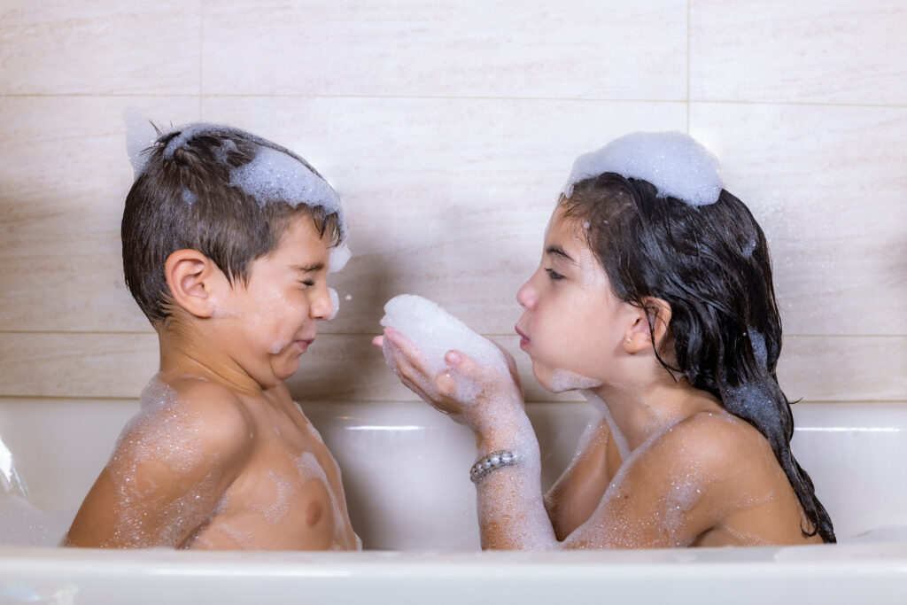 Children playing in a foam bath